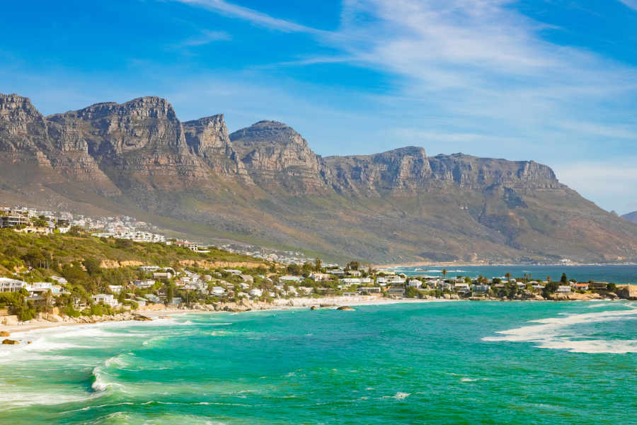 The breathtaking view of the rocky cliffs by the ocean captured in Cape Town, South Africa